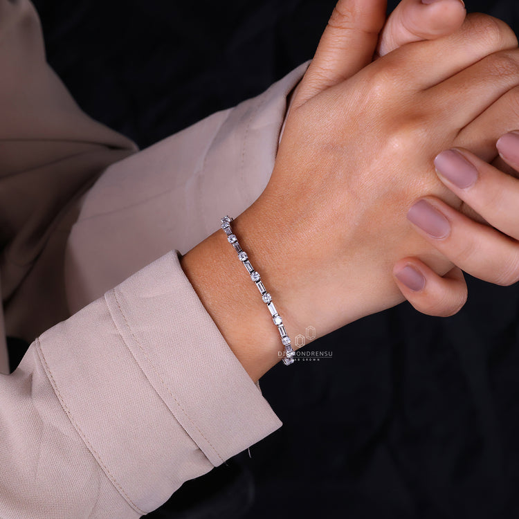 White gold bracelet featuring round and baguette cut Lab Grown Diamonds.
