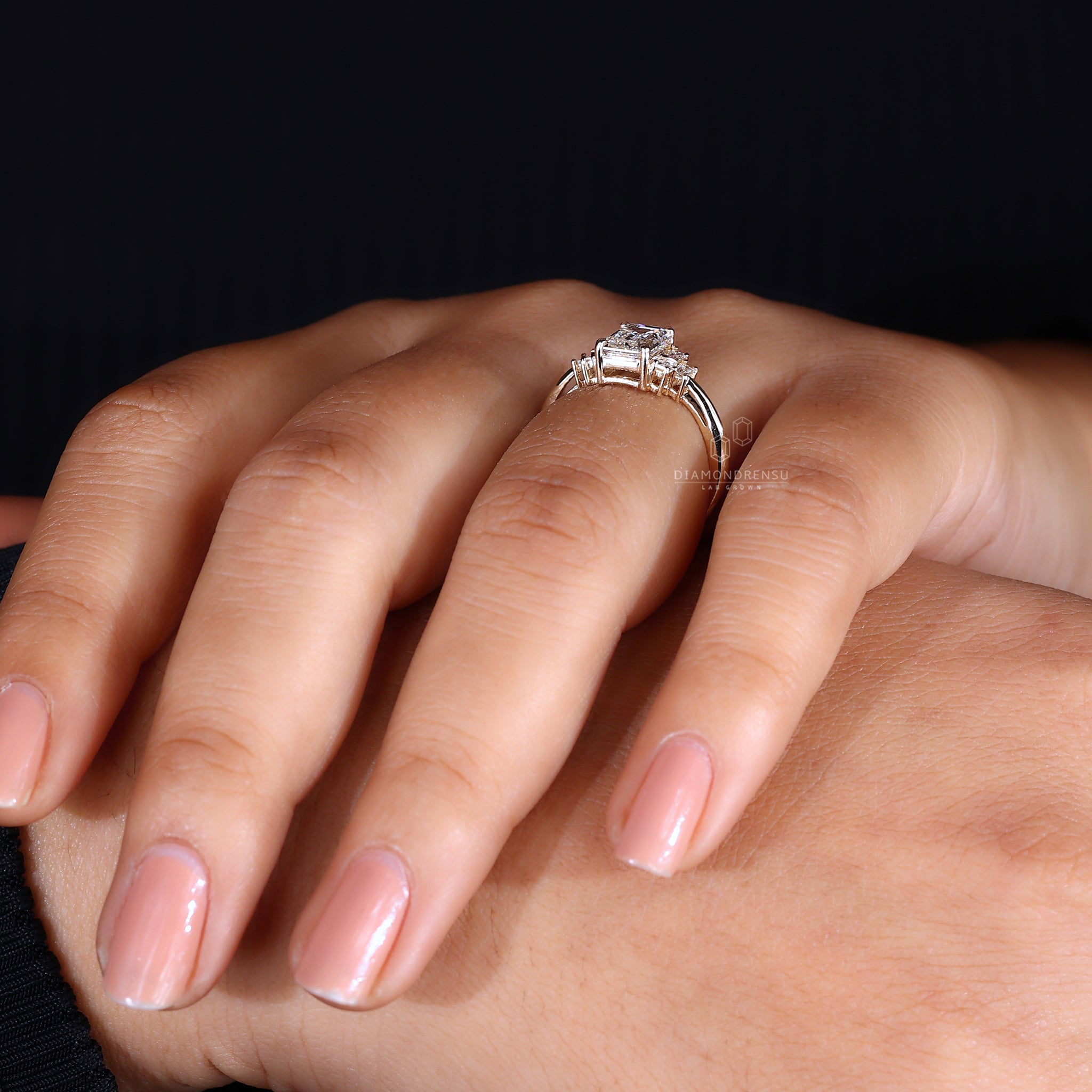 Seven stone diamond ring in yellow gold ring.
