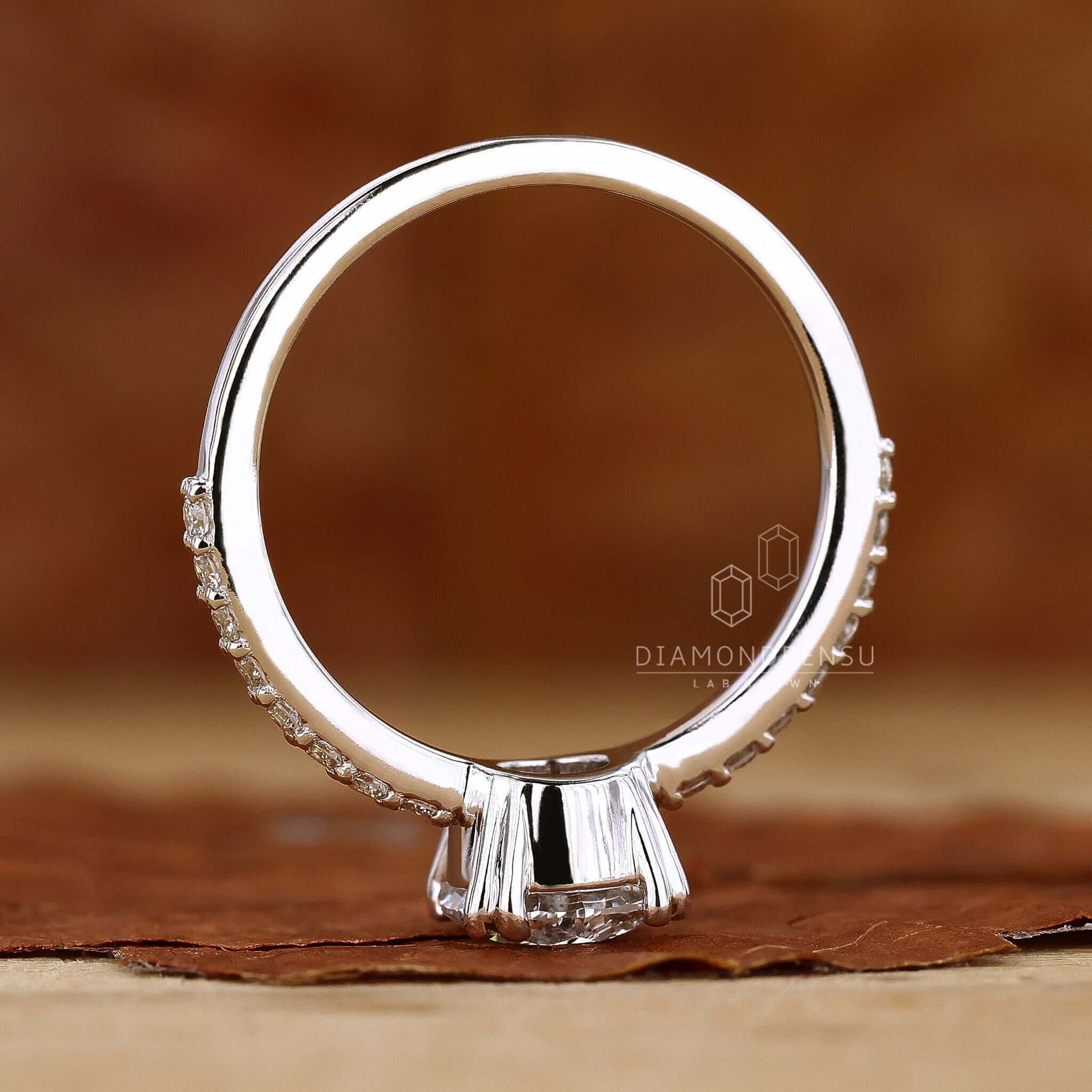 Double prong setting for added security and elegance in a beautifully crafted engagement ring.