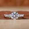 Hidden halo engagement ring with round diamond ring.

