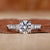 Hidden halo engagement ring with round diamond ring.
