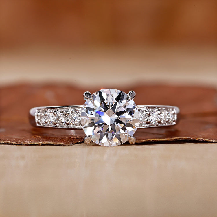 Hidden halo engagement ring with round diamond ring.
