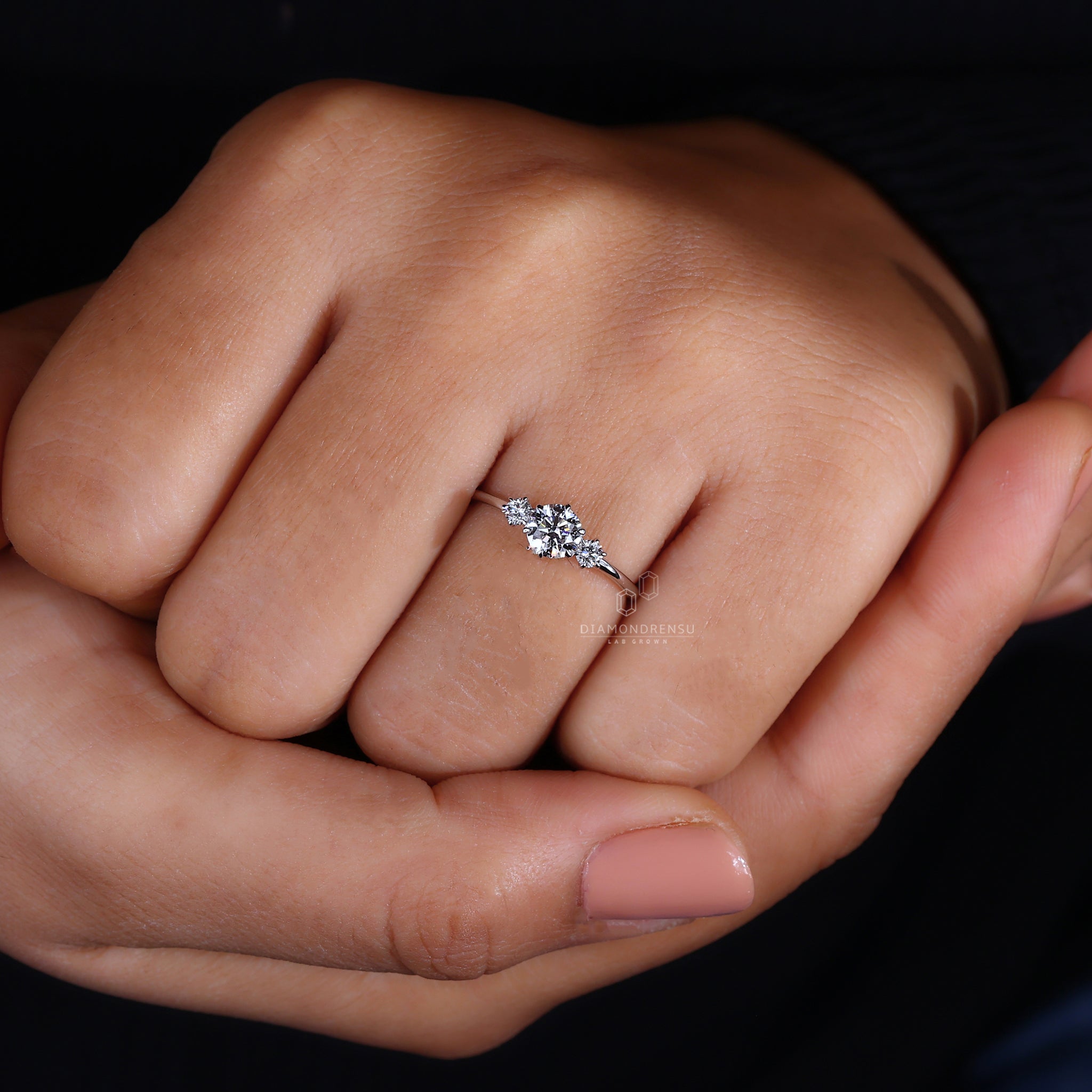 Diamonds London UK 3 stone ring.

