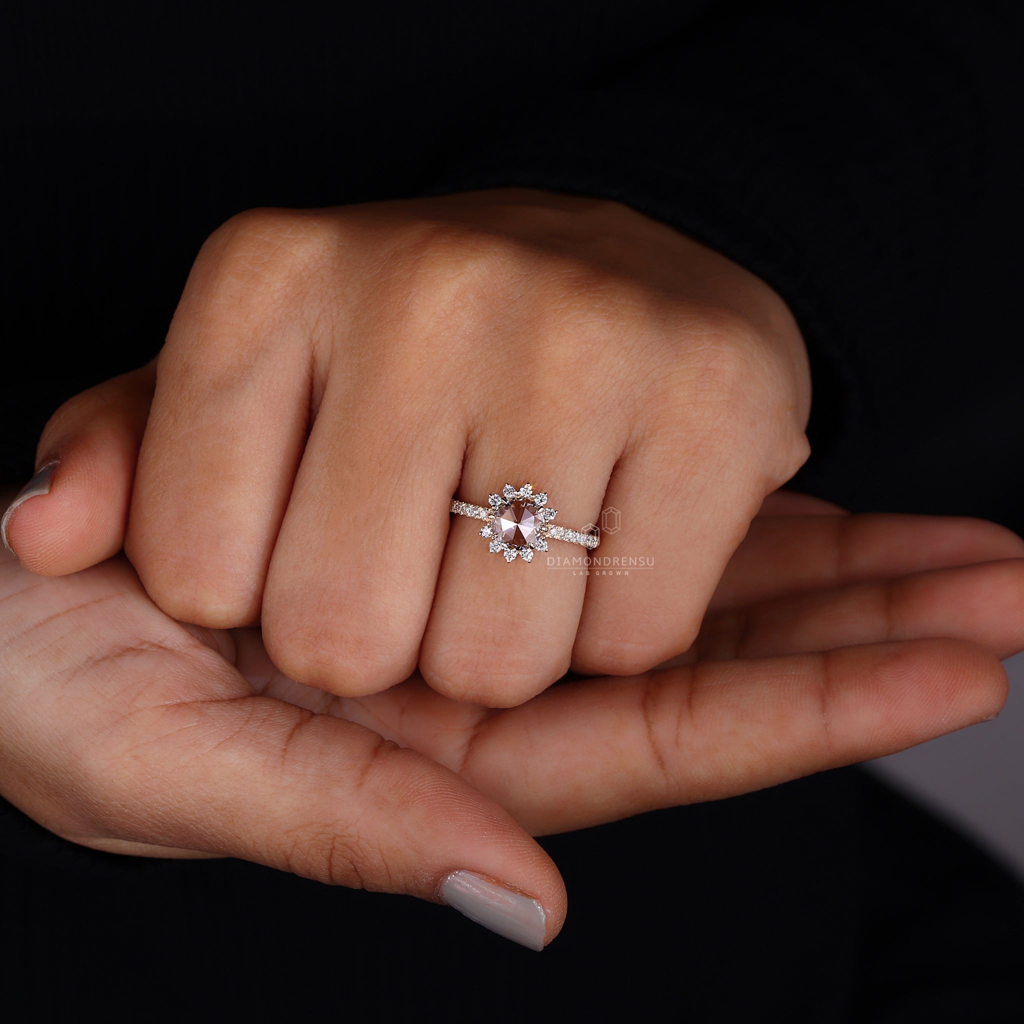 Yellow gold engagement ring with a vibrant diamond centrepiece.