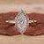 Halo Diamond Engagement Ring with claw prong setting.

