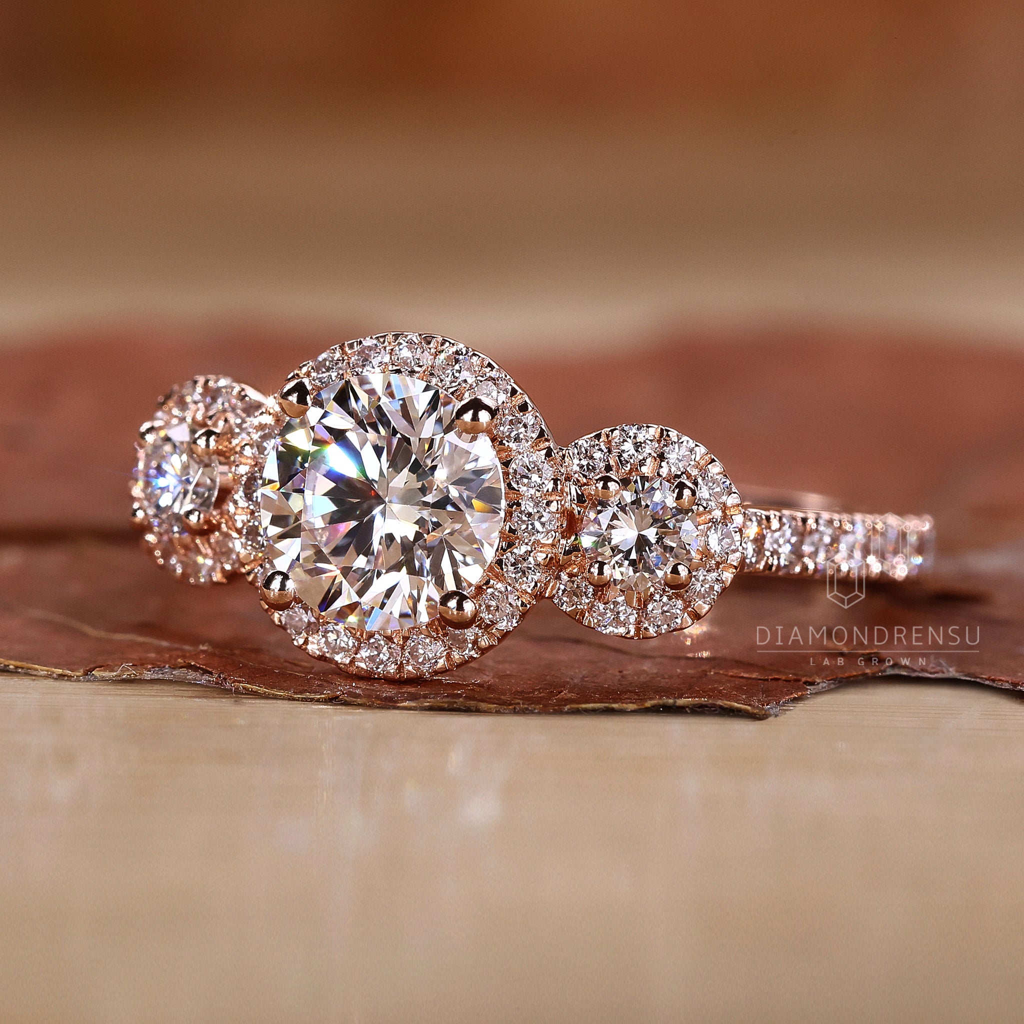 Halo setting with round cut center diamond.
