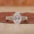 Hidden Halo Engagement Ring with oval cut diamond ring design.
