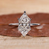 Hidden halo engagement ring with Dutch marquise diamond ring.
