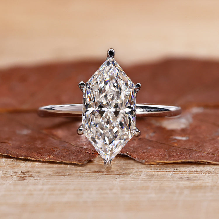 Hidden halo engagement ring with Dutch marquise diamond ring.
