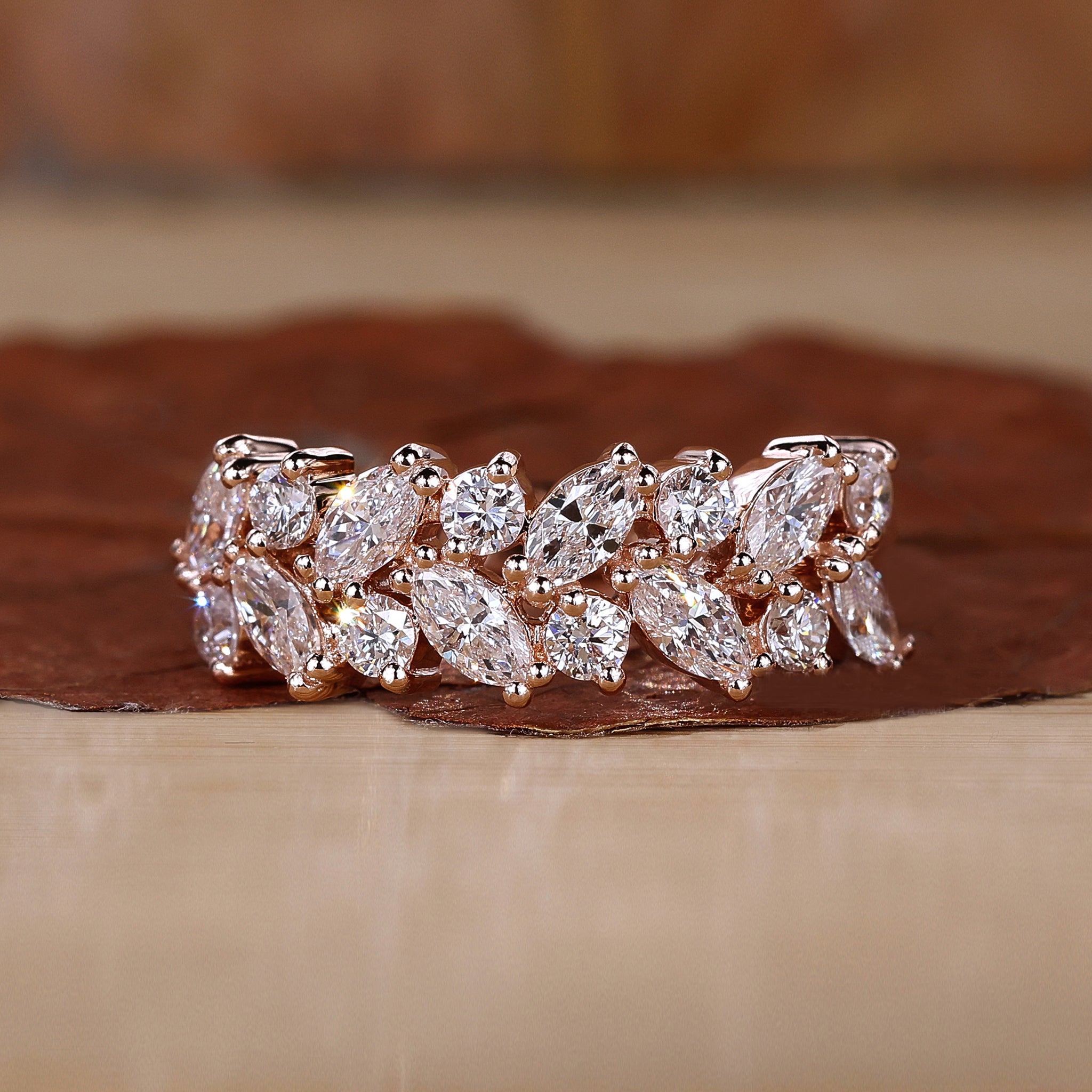 Two row diamond wedding band with marquise and round diamonds.
