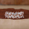 Two row diamond wedding band with marquise and round diamonds.

