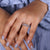 Half eternity wedding band with marquise and round diamonds.
