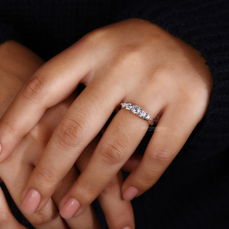 Yellow gold wedding band with lab grown round diamonds
