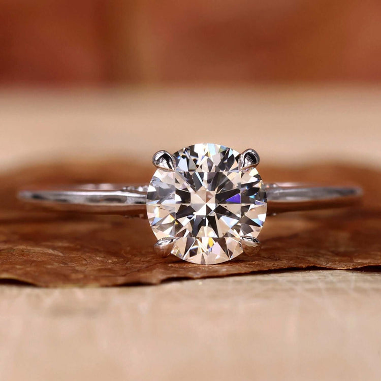 Elegant engagement ring hidden halo design with sparkling diamonds.