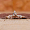 Round and marquise diamond wedding band.
