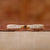 Three row pave diamond band in yellow gold.
