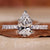 Pear shape engagement ring featuring a stunning diamond centre.