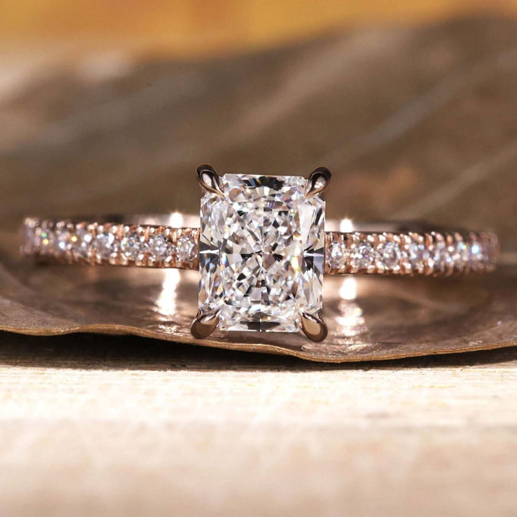 Radiant engagement ring with a stunning claw prong design

