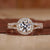 Split shank engagement ring in yellow gold.
