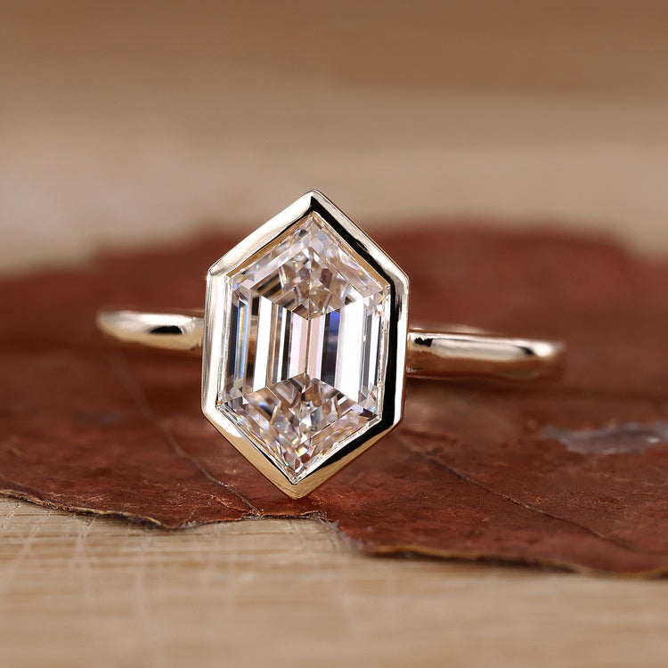 Solitaire engagement ring with hexagon engagement ring design.
