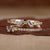 Diamond and baguette wedding band in yellow gold
