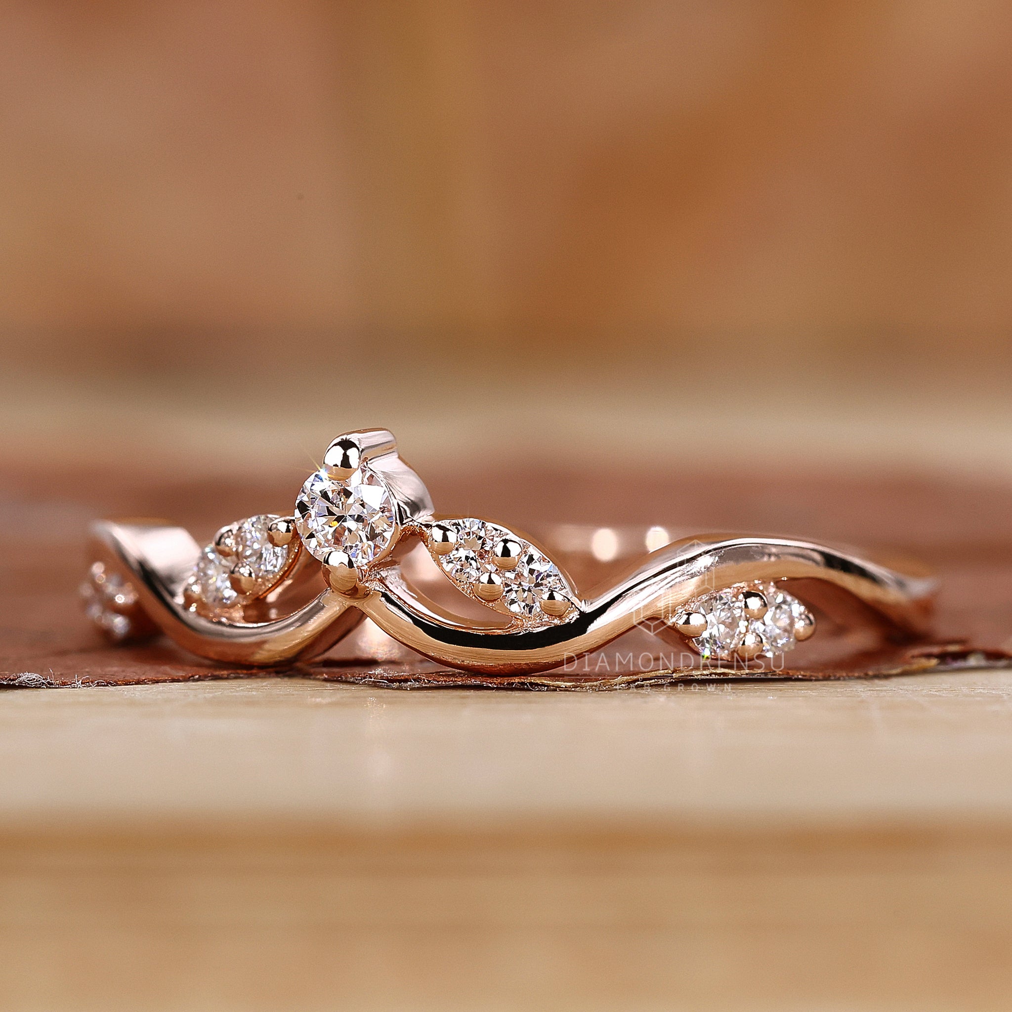 Handmade round diamond curved wedding band.
