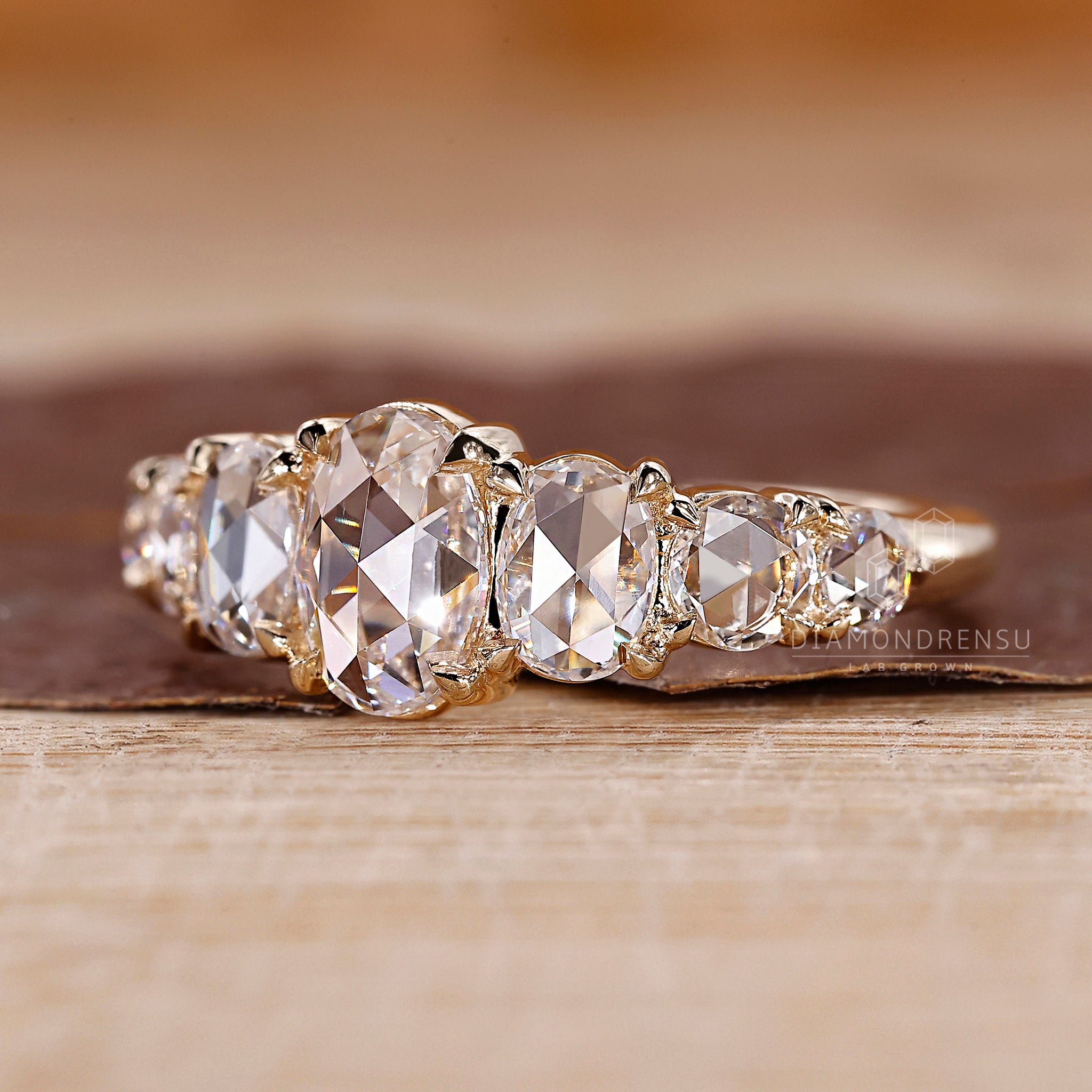 7 stone ring featuring rose cut lab grown diamonds.
