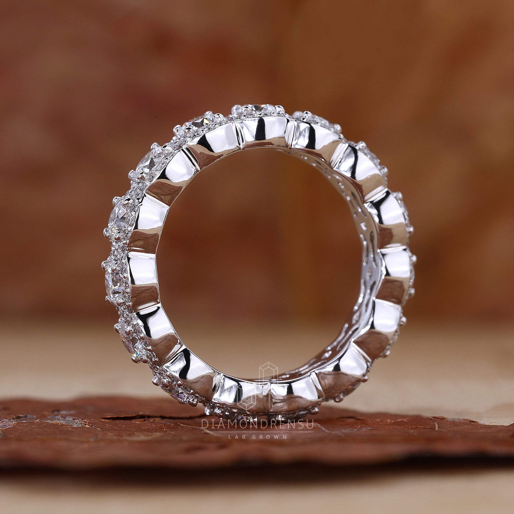 Round cut diamond halo eternity wedding band in white gold
