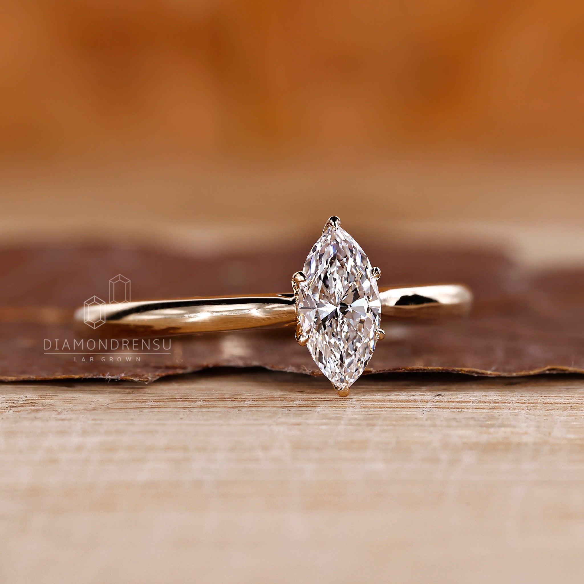 Tulip setting ring with marquise cut lab grown diamond.
