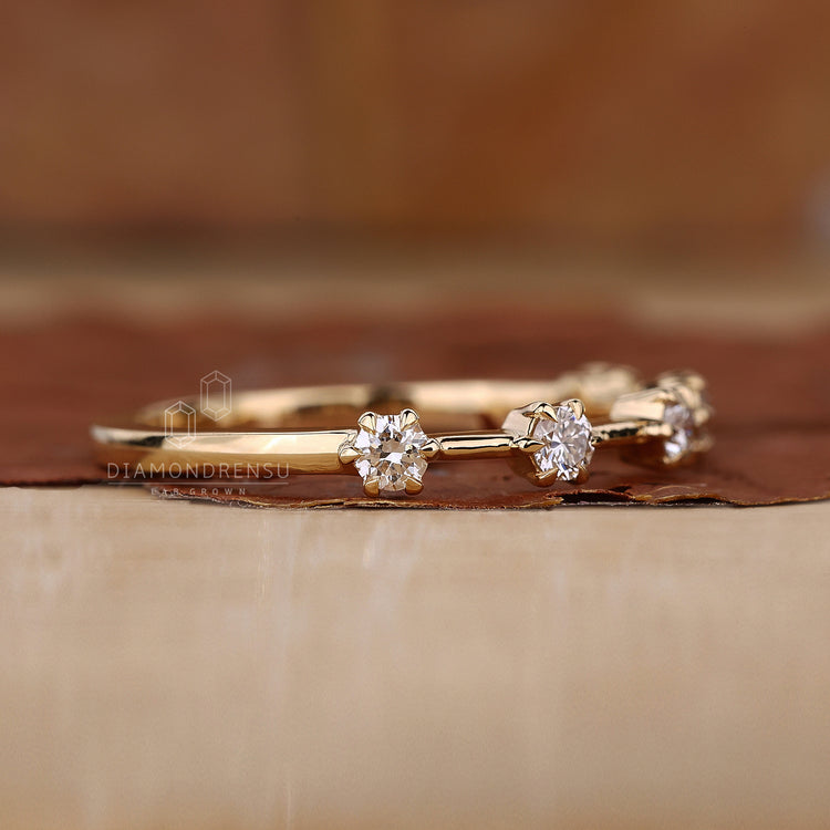 Lab grown diamond half eternity wedding band in yellow gold

