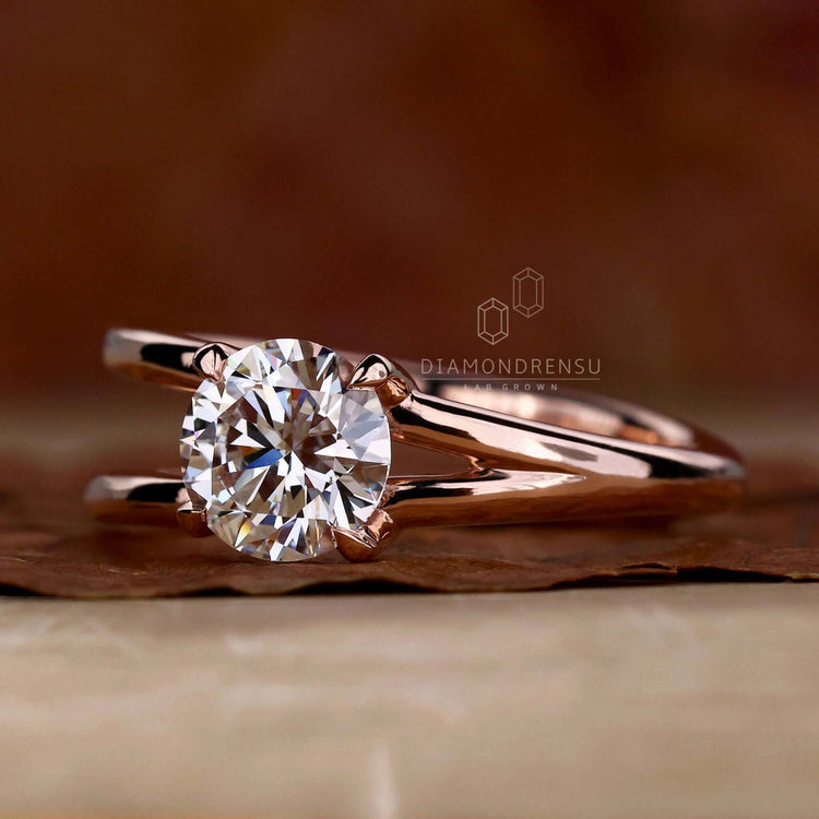 Handmade split shank ring showcasing a 4 prong claw setting diamond.