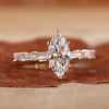 Marquise cut diamond ring in yellow gold.
