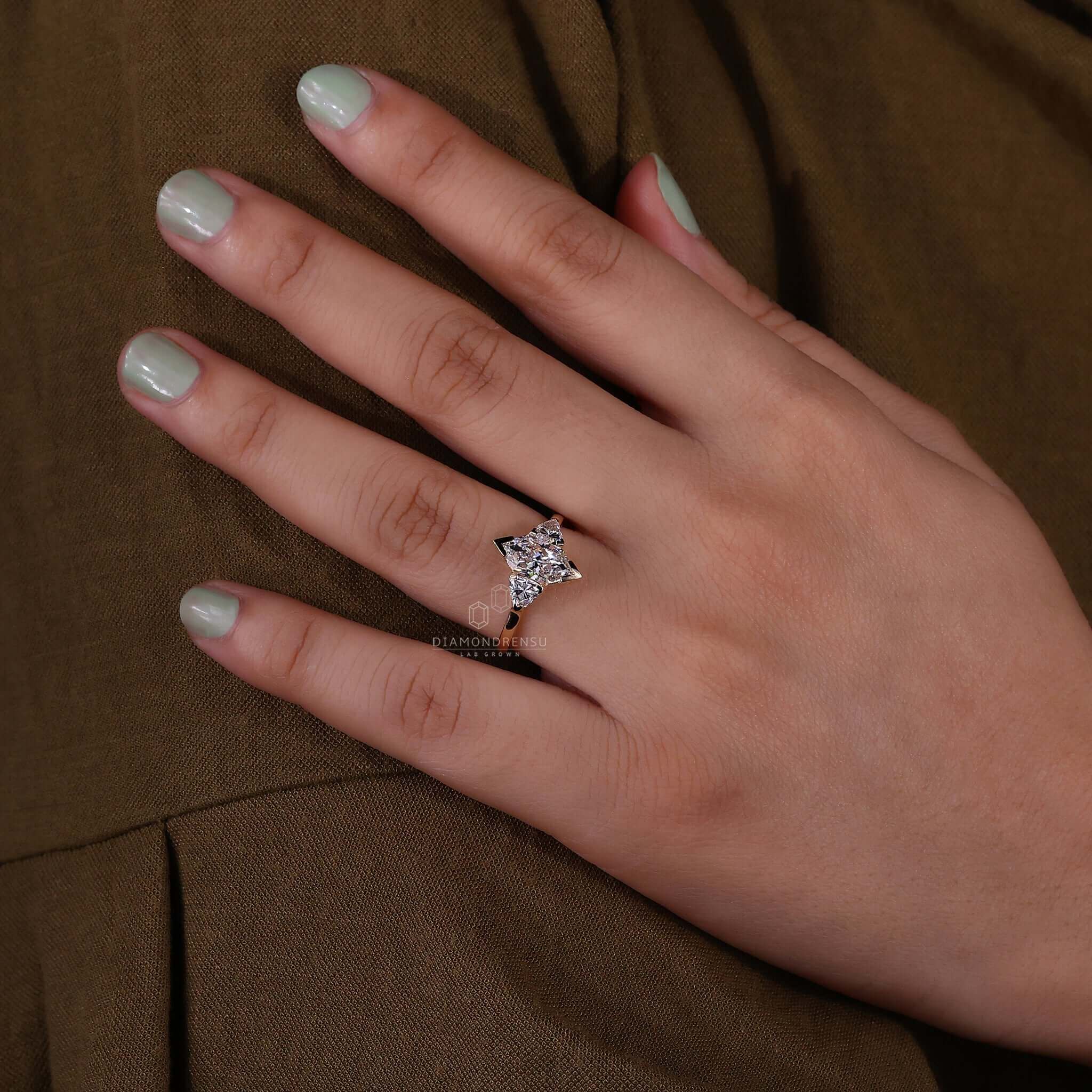 Three stone diamond ring with lab-grown diamonds in a classic setting.