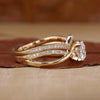 Curved wedding band with pave diamonds.
