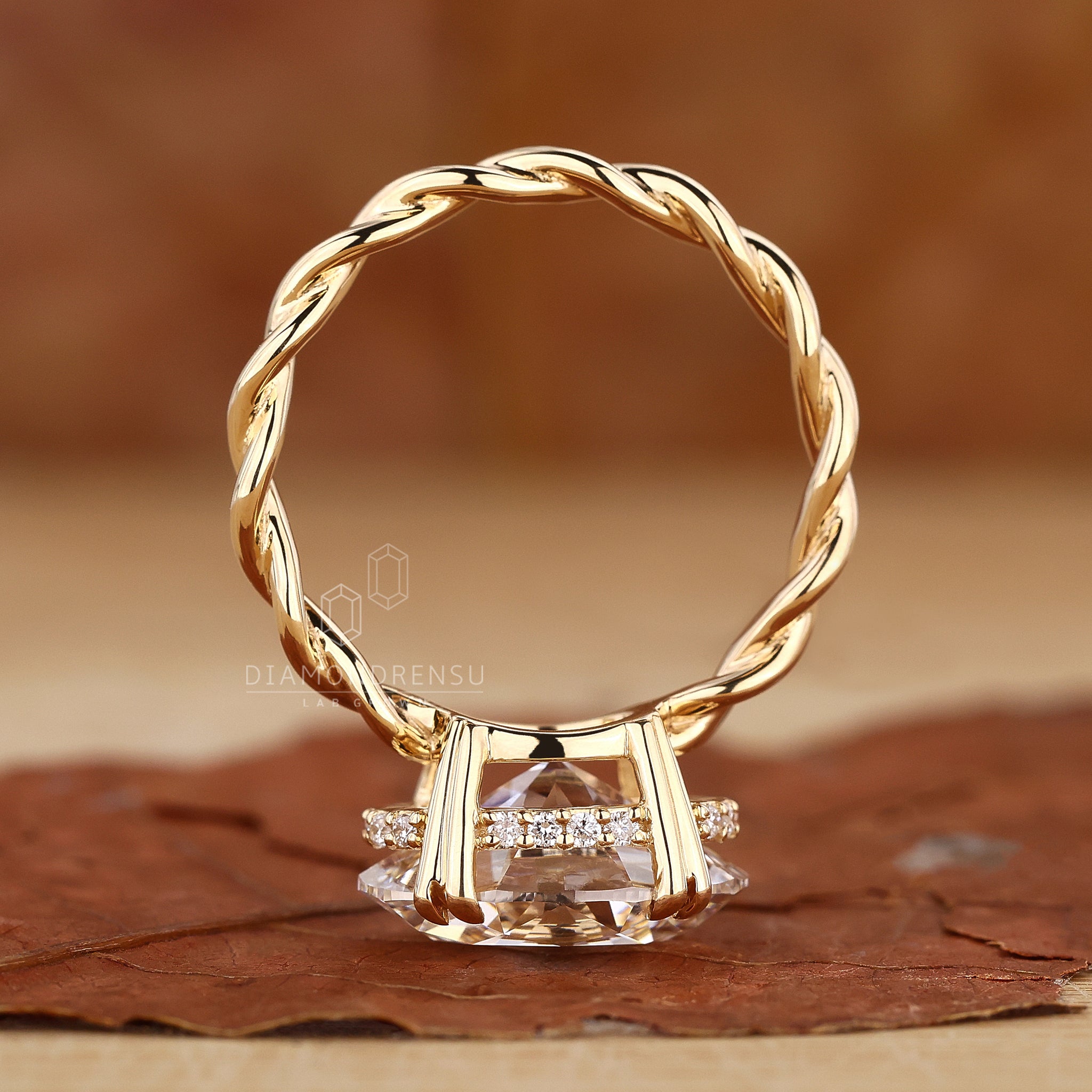 Handmade ring featuring twisted shank engagement ring
