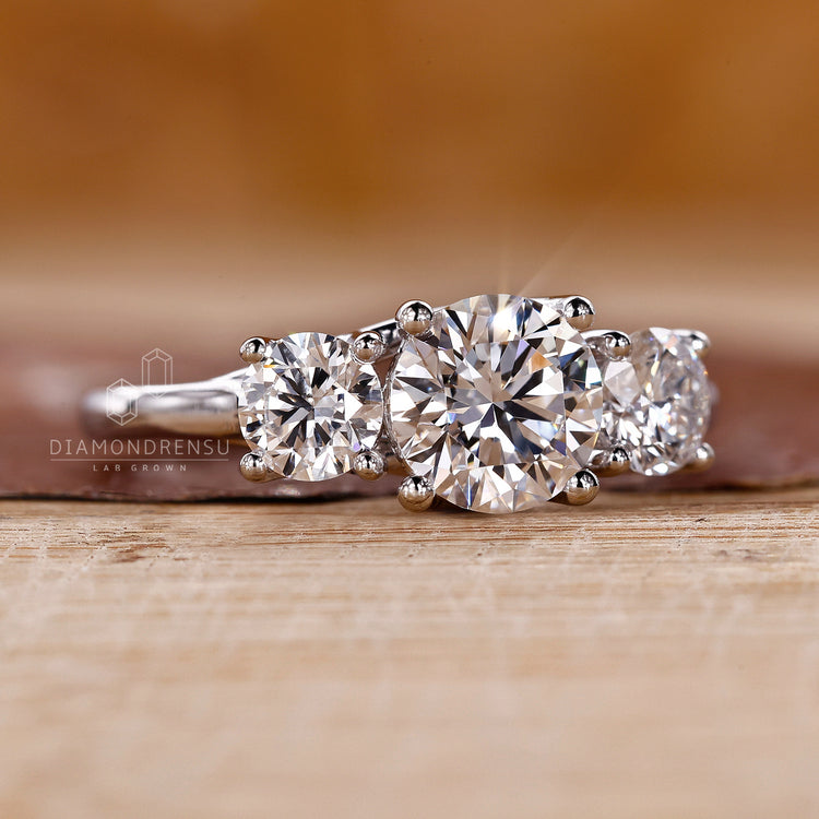 Lab grown diamond ring with prong setting and custom design.
