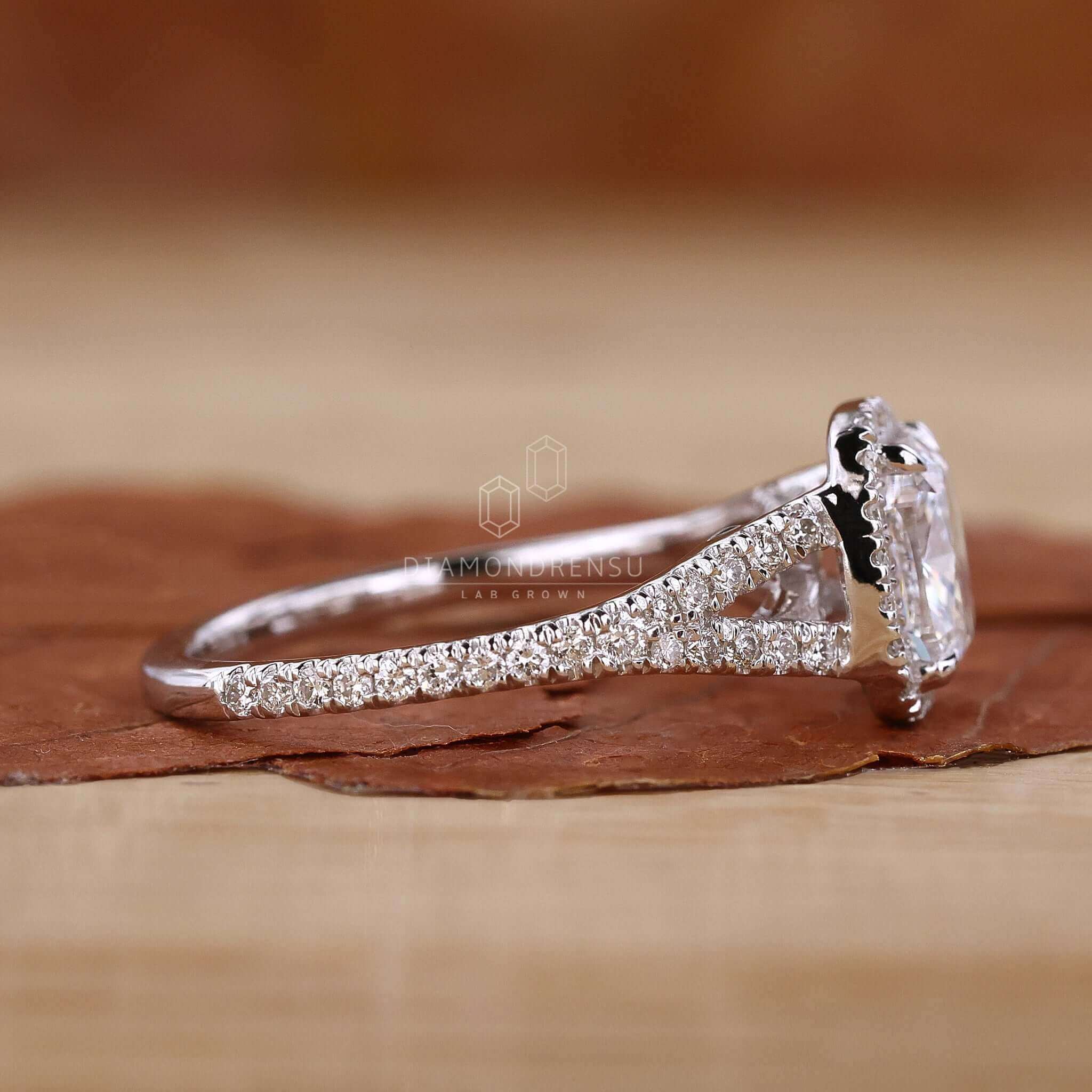 Discover the brilliance of an elongated cushion cut diamond ring that dazzles from every angle.