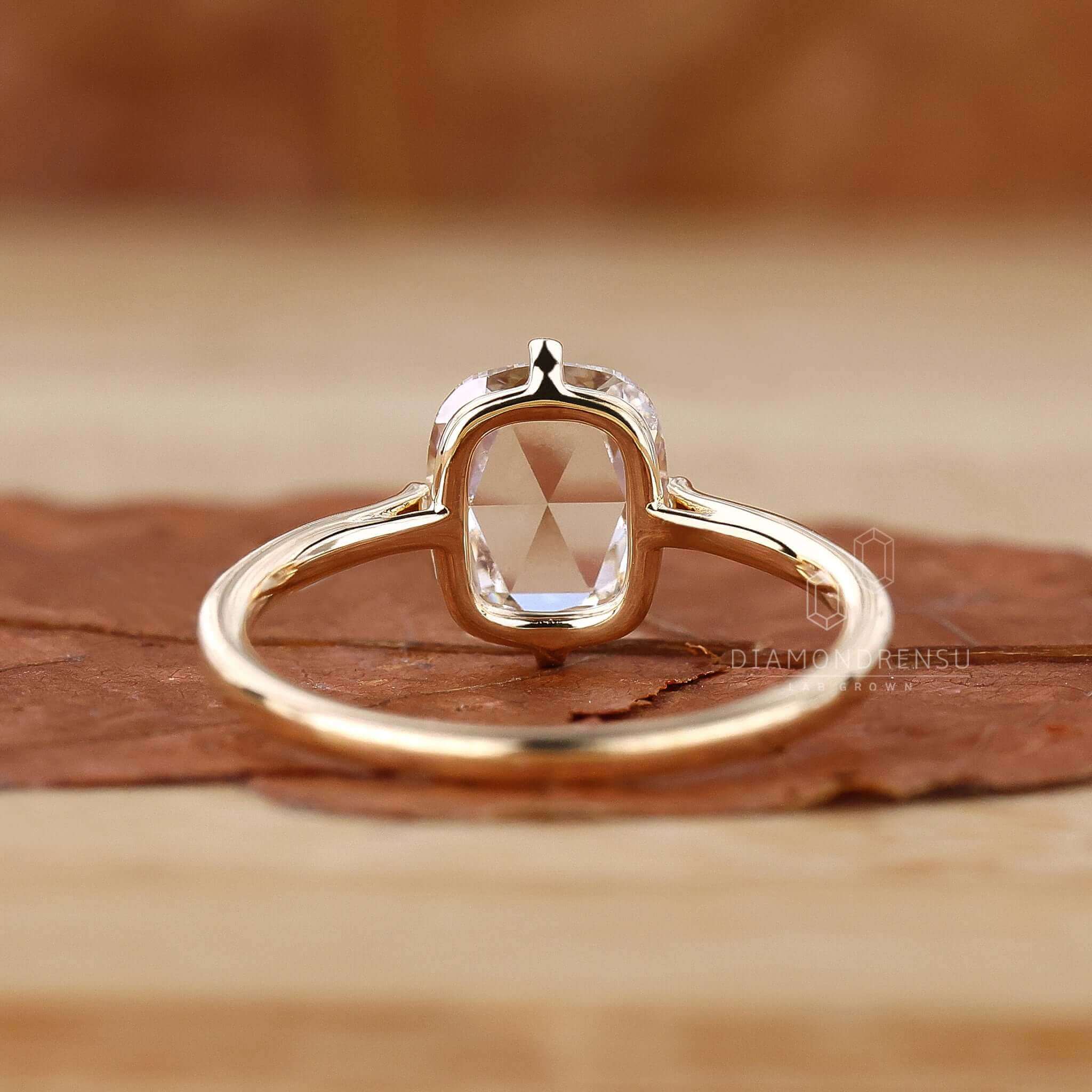 Solitaire ring with diamonds, offering a minimalist yet sophisticated engagement option.