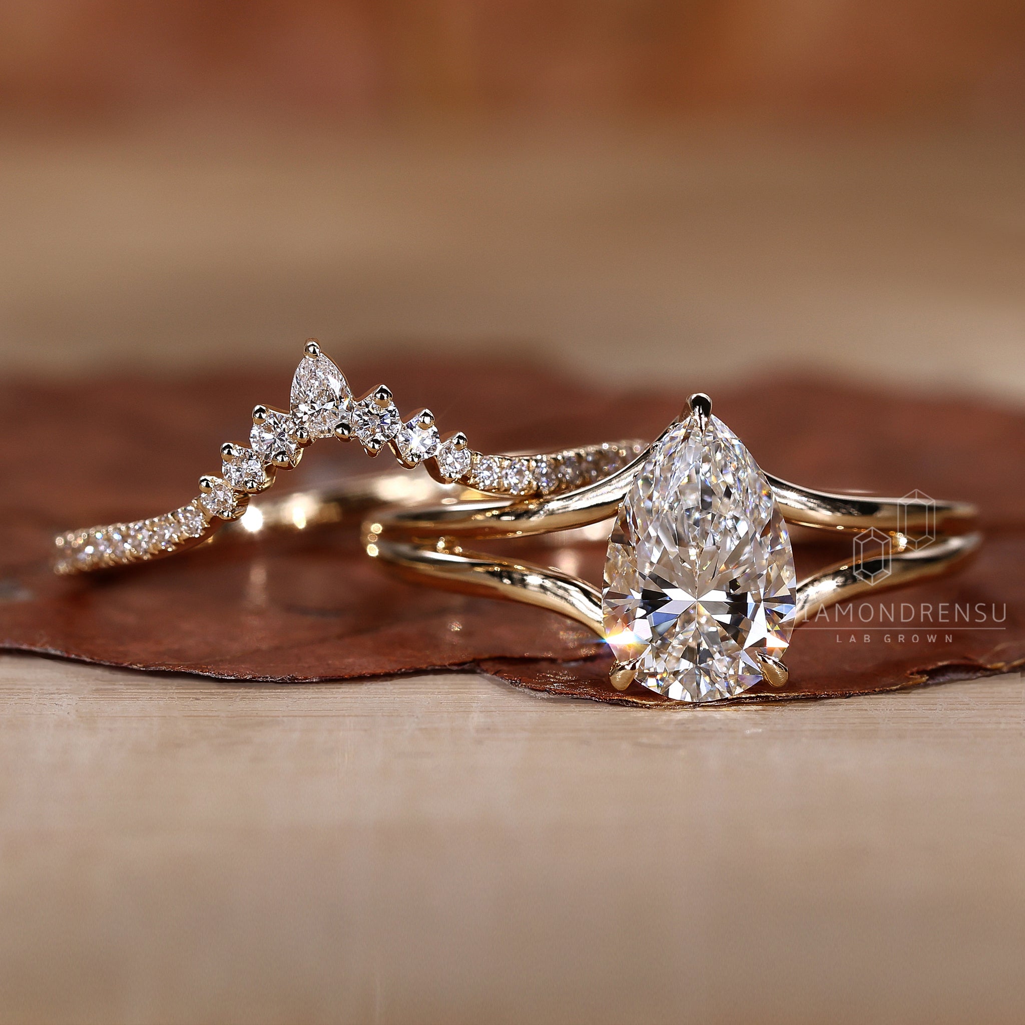 Hidden halo pear engagement ring.
