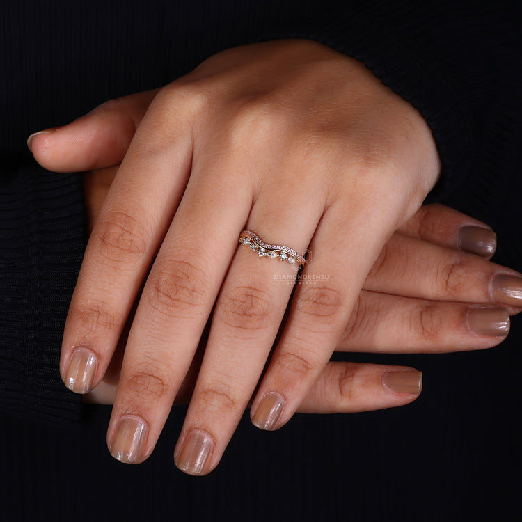 Half eternity wedding band with pink round diamonds.
