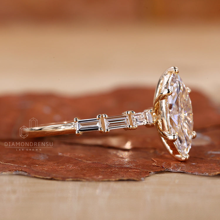 Six round prong setting marquise diamond ring.
