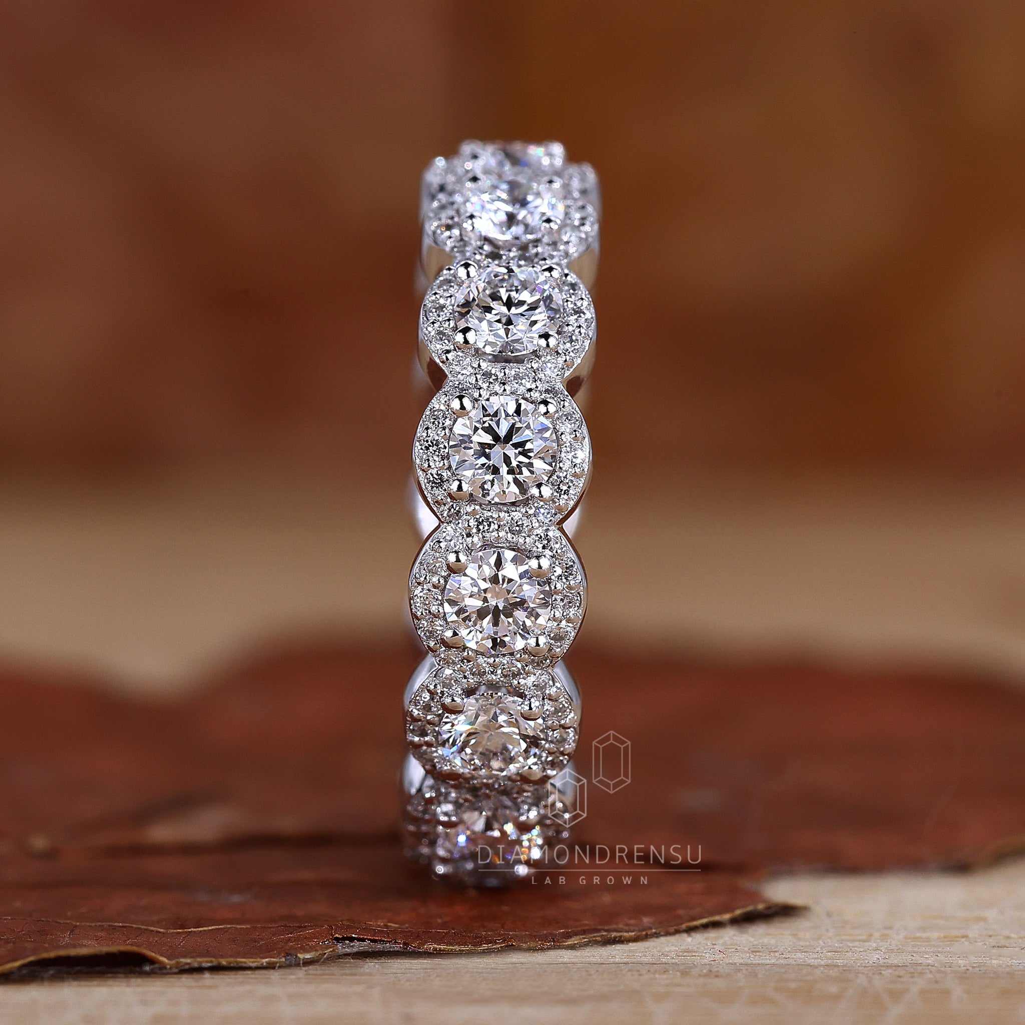 Lab diamond halo eternity band in white gold
