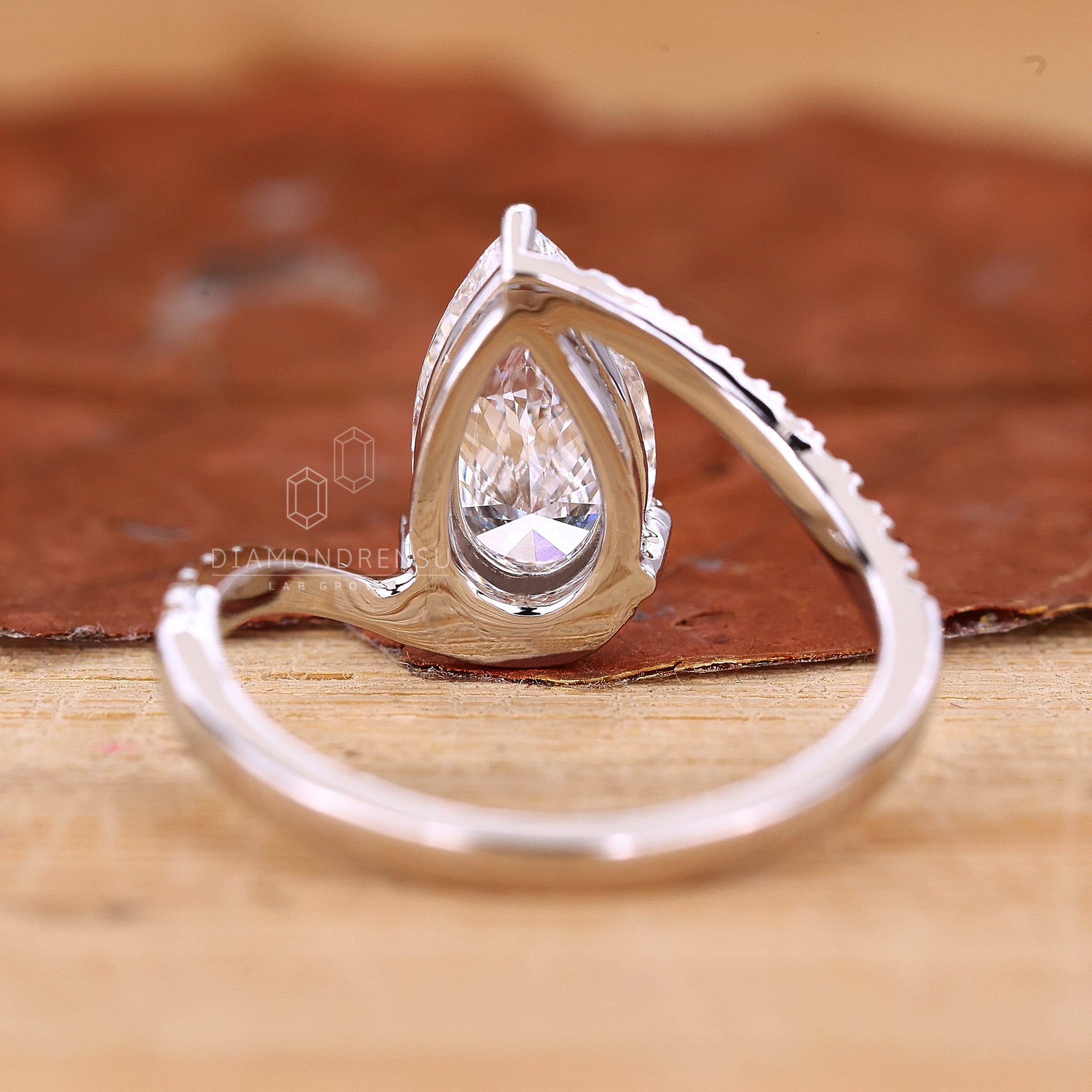 UK engagement ring designed with pave setting.
