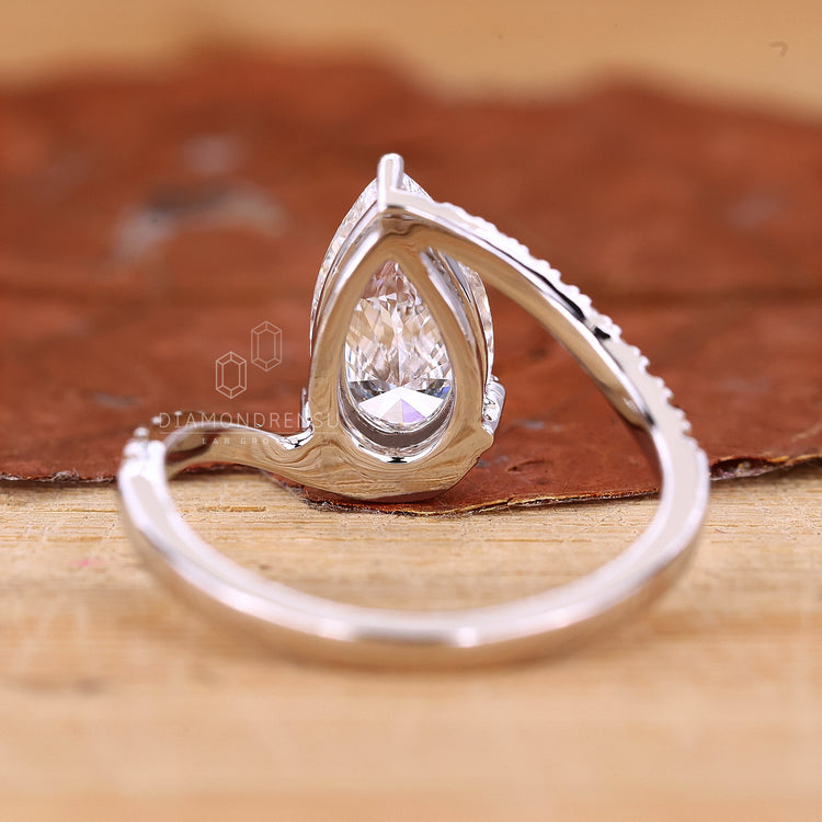 UK engagement ring designed with pave setting.
