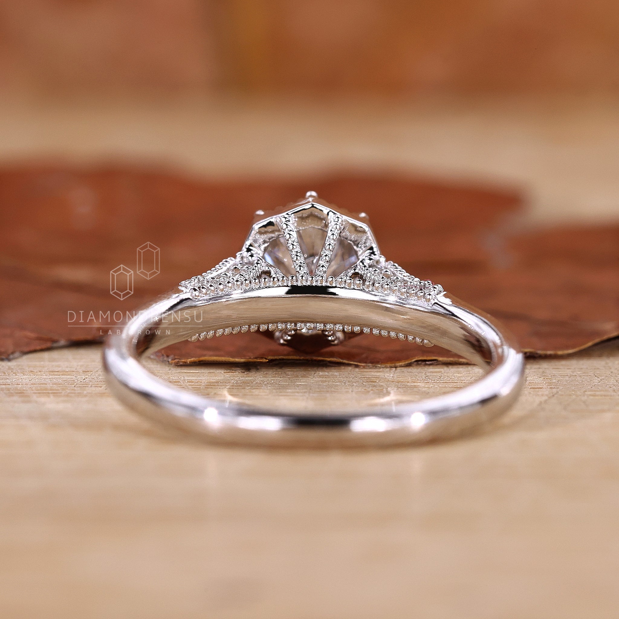 Milgrain engagement ring in white gold.
