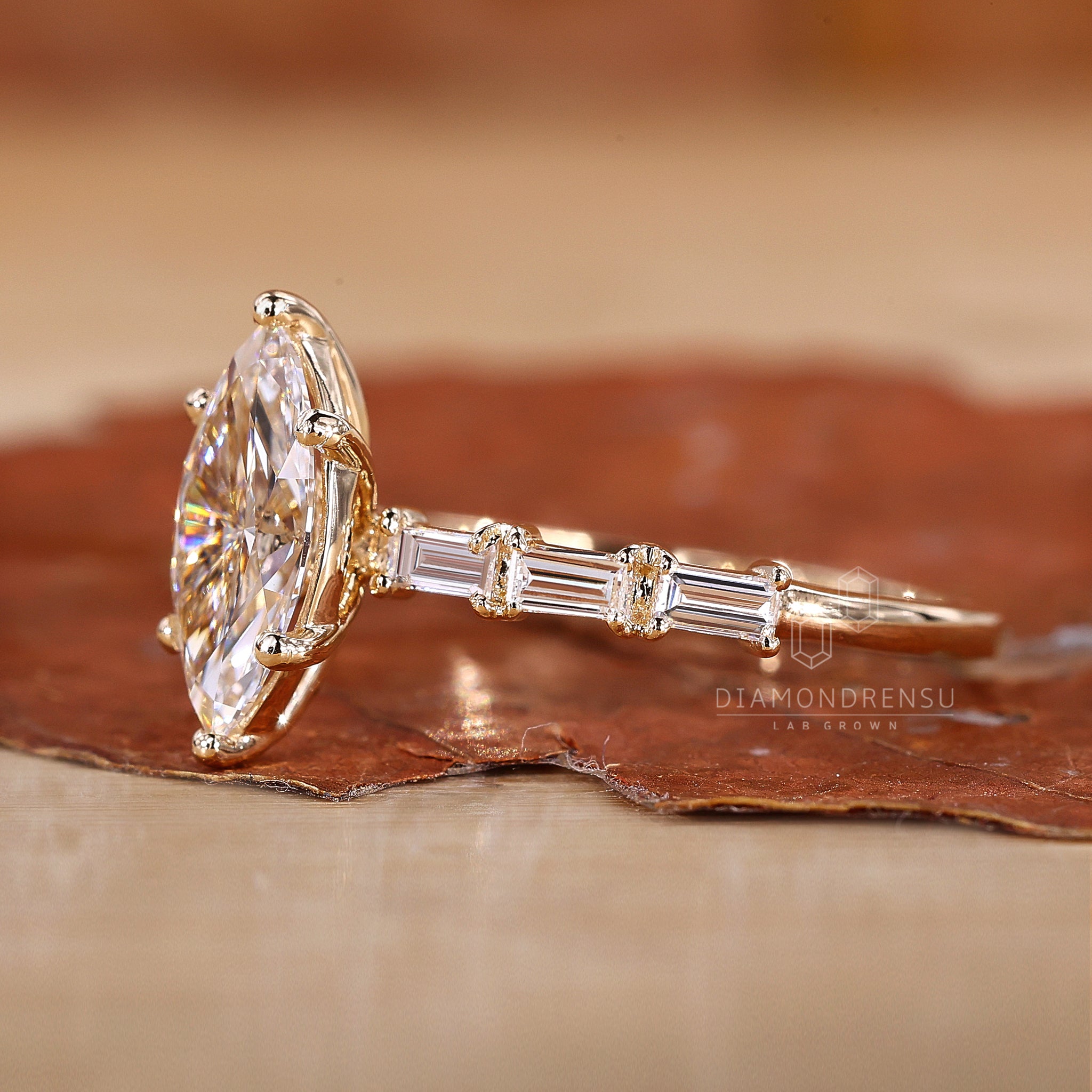 Buy engagement ring with baguette side stones.
