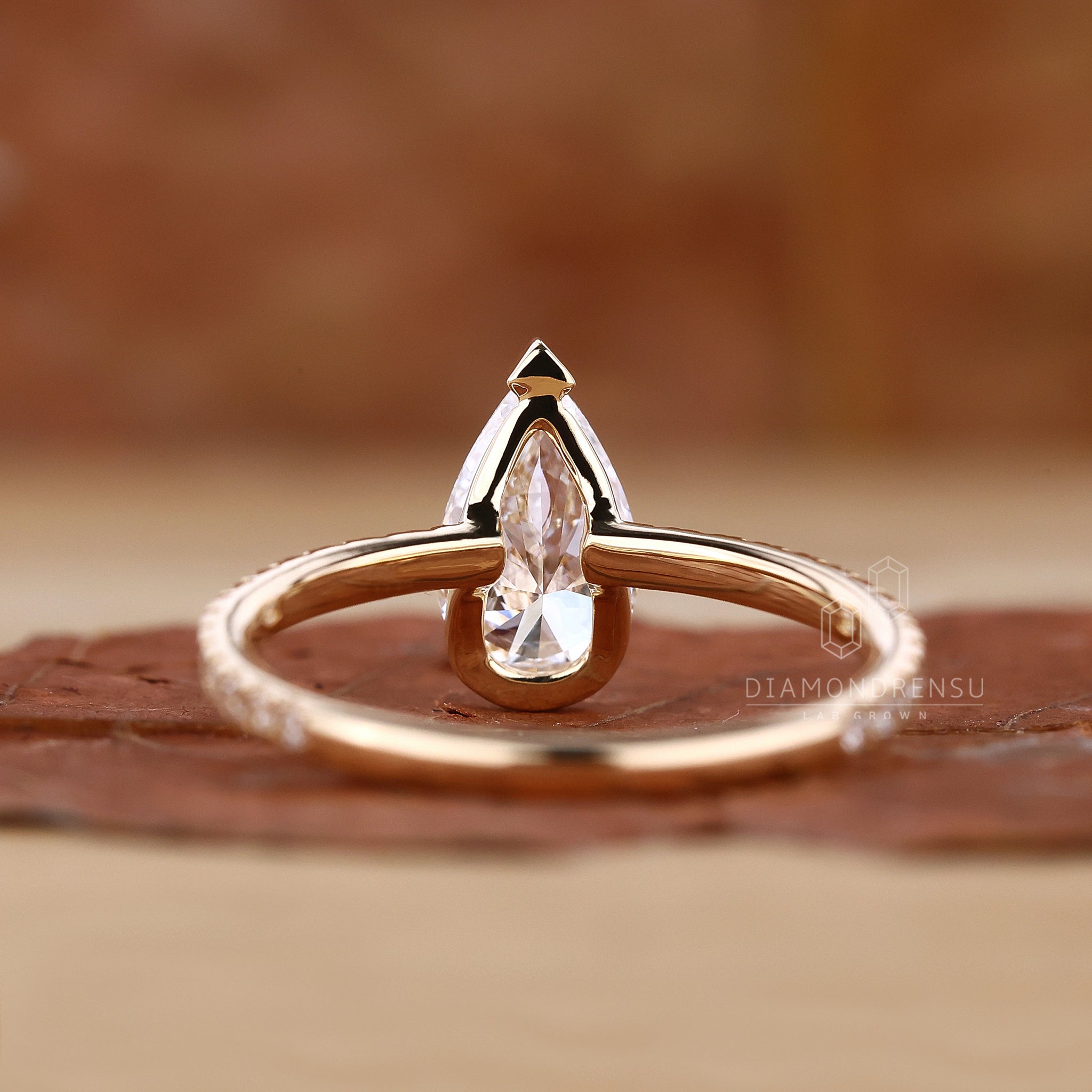 Half bezel diamond ring offering a sleek and modern look.