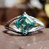 Split shank pave engagement ring with Asscher cut moissanite.