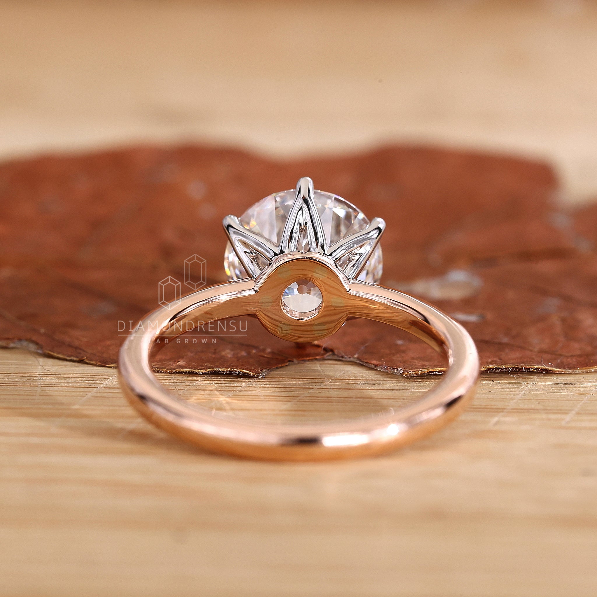 Rose and white gold ring with old european cut diamond engagement ring

