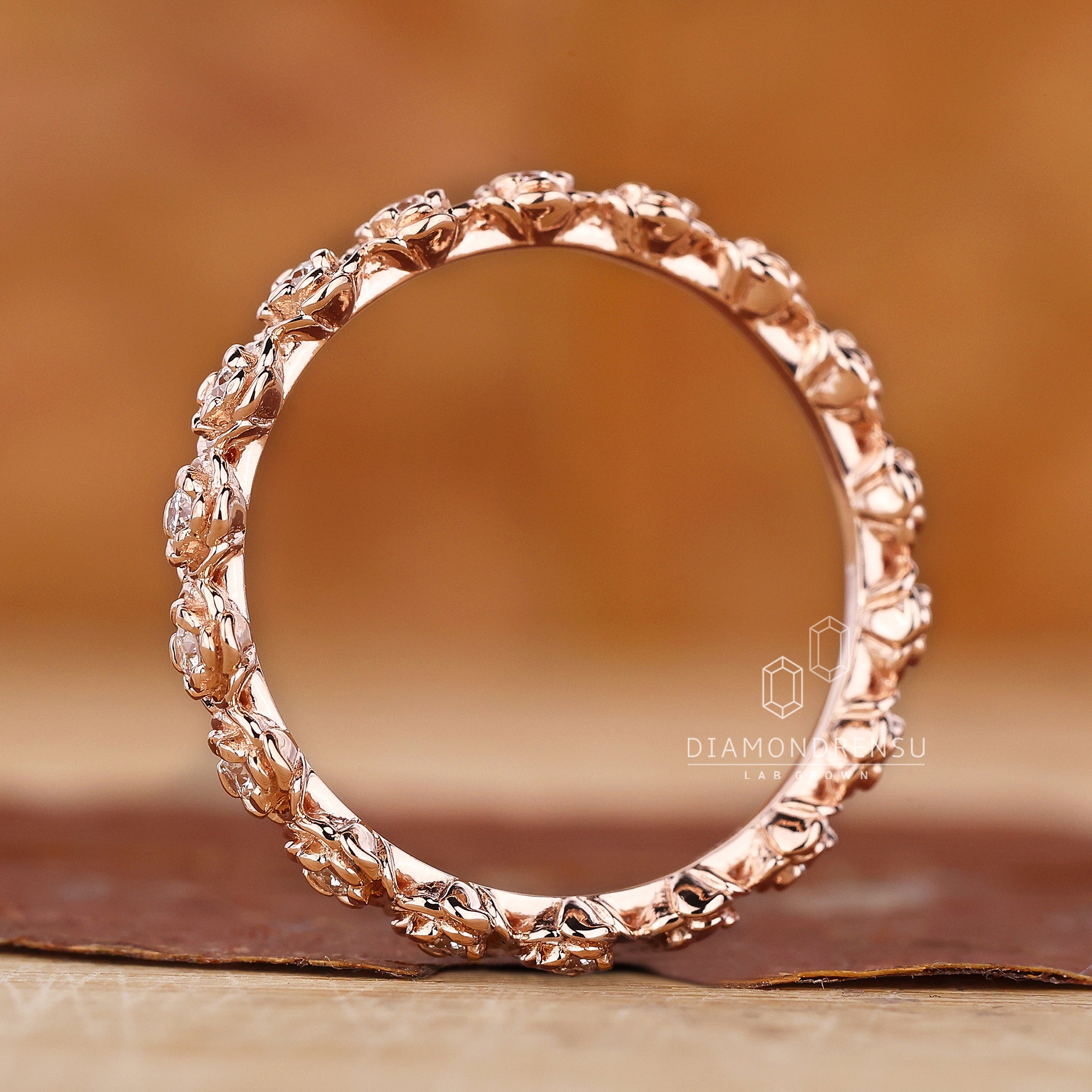 Round diamond wedding band with eternity setting

